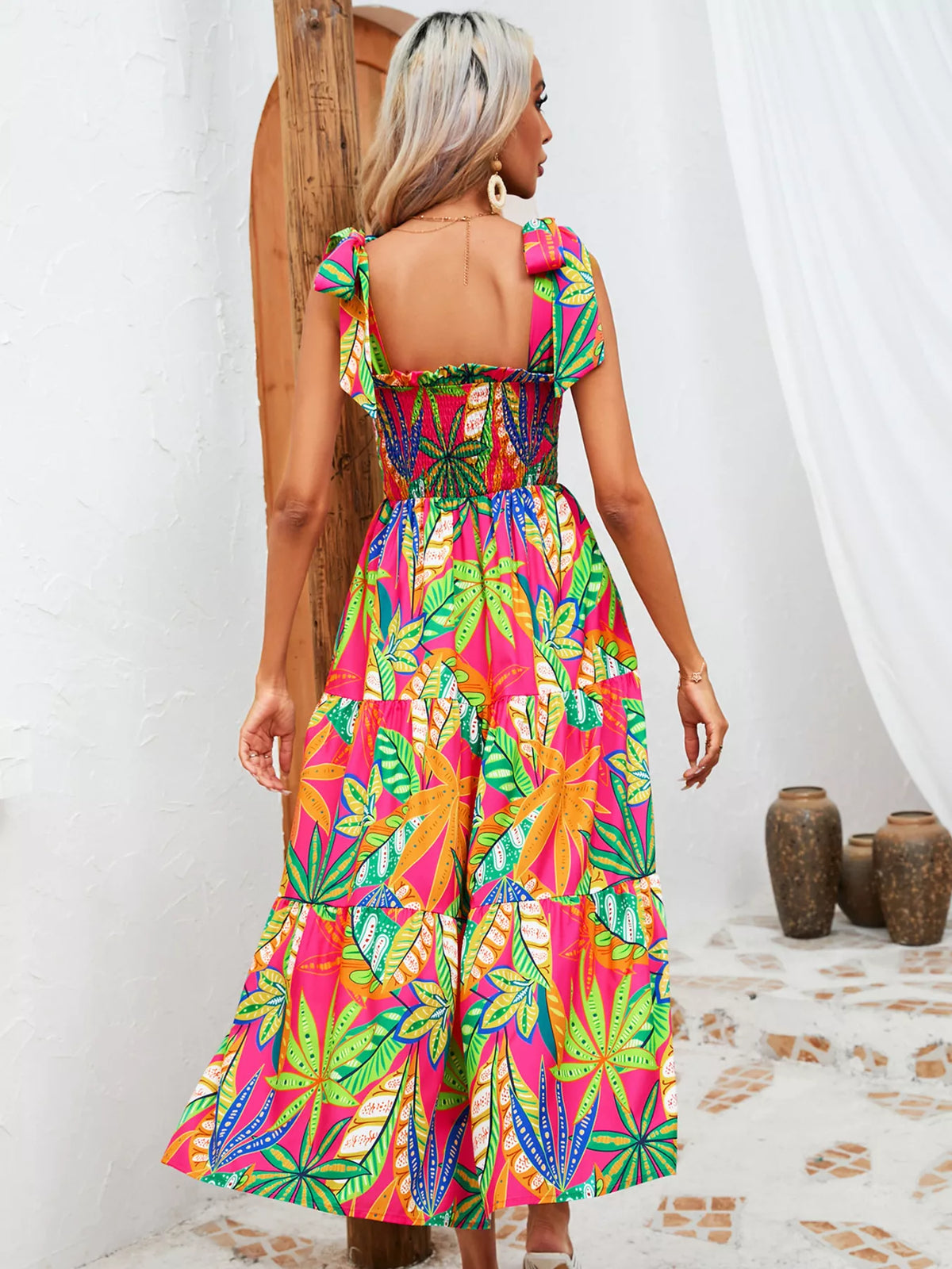 Tropical print smocked tie strap dress detail view