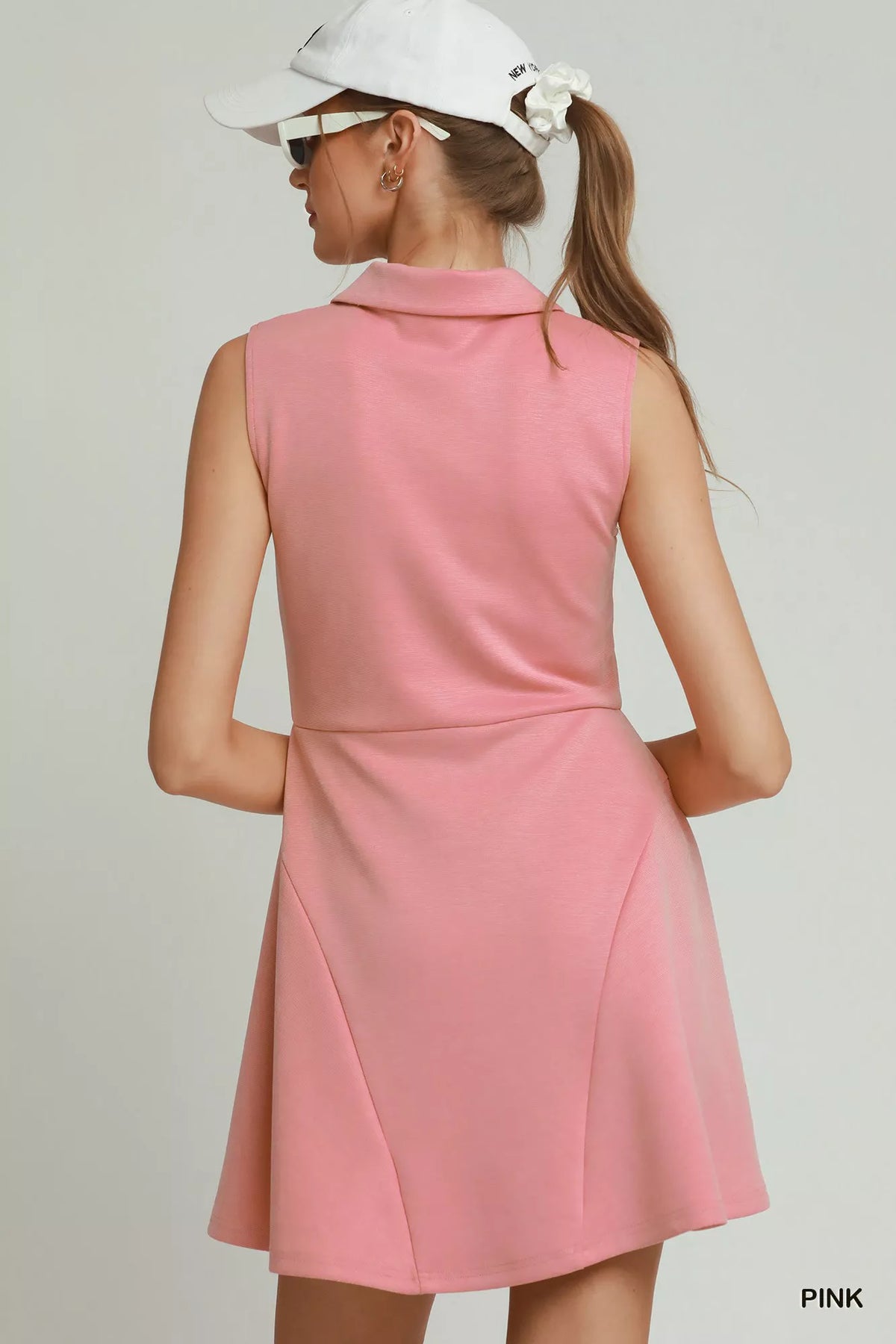 Pink collared quarter zip tennis dress side view