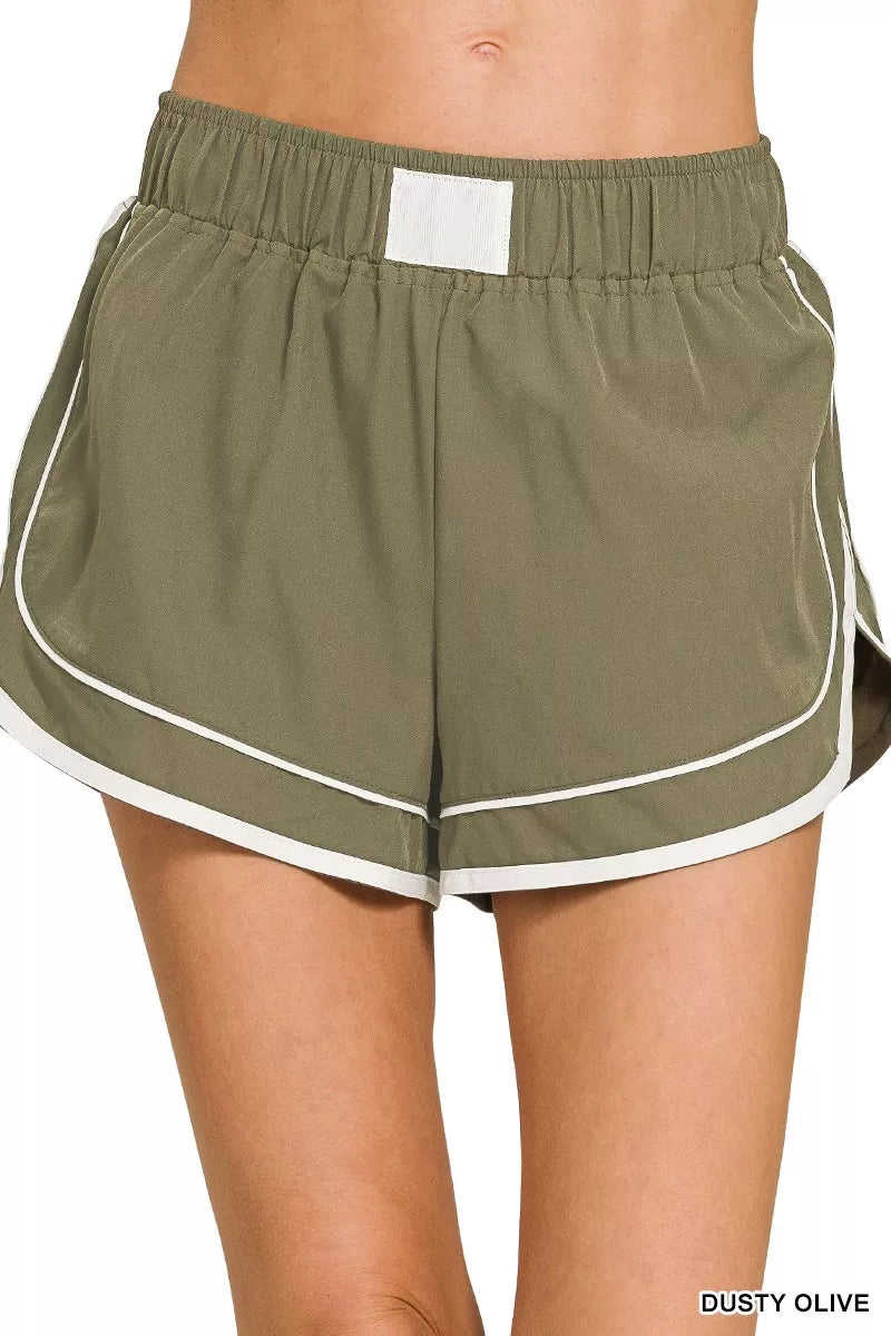 Dusty olive Zenana soft woven dolphin shorts front view