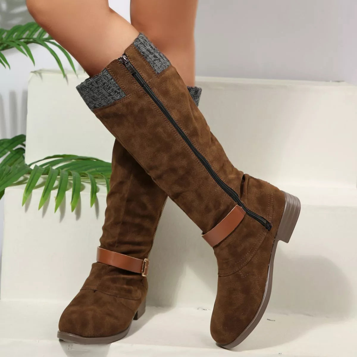 Green round toe block heels boots pair standing together