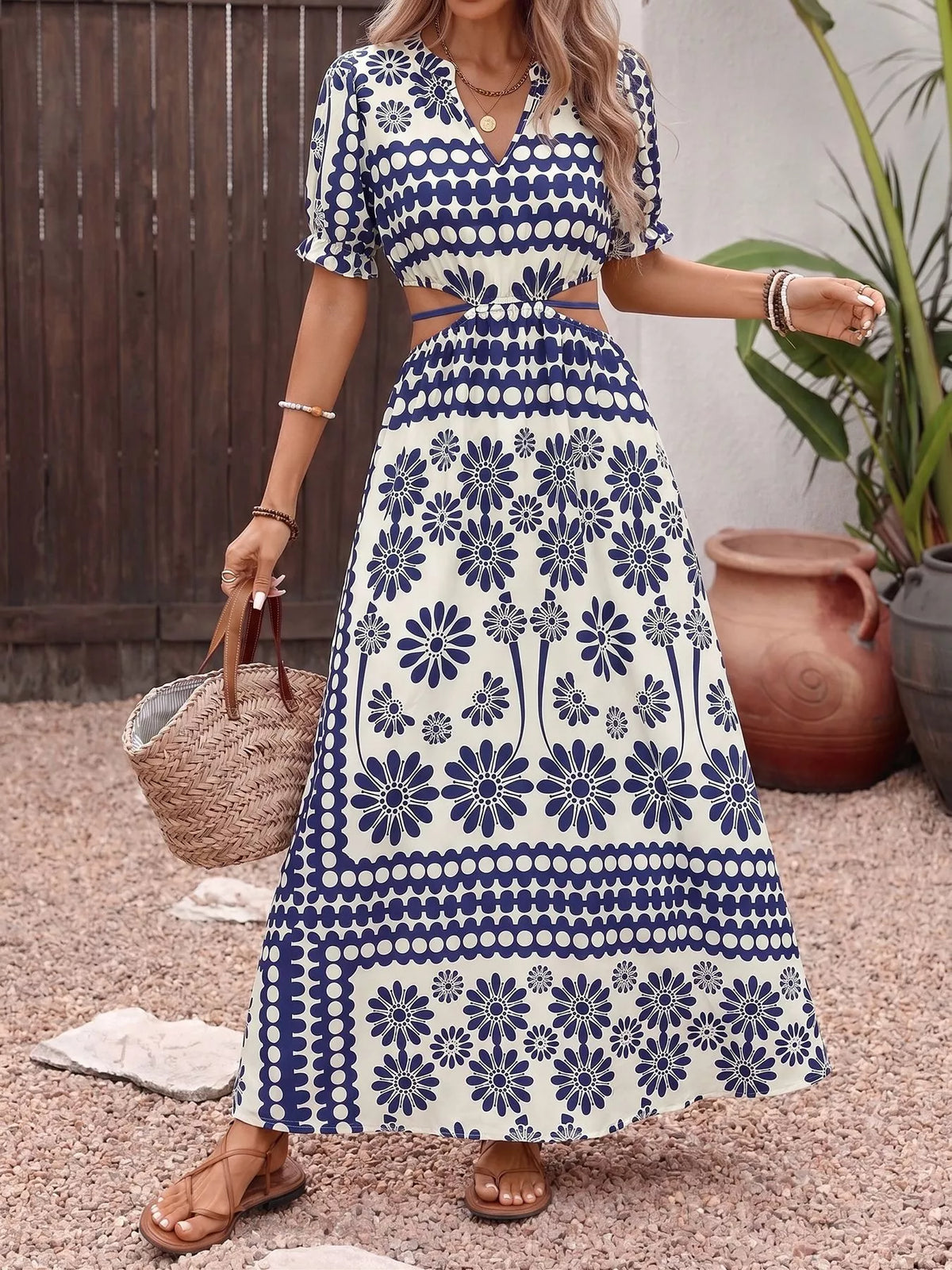 navy blue floral cutout waist maxi dress front view