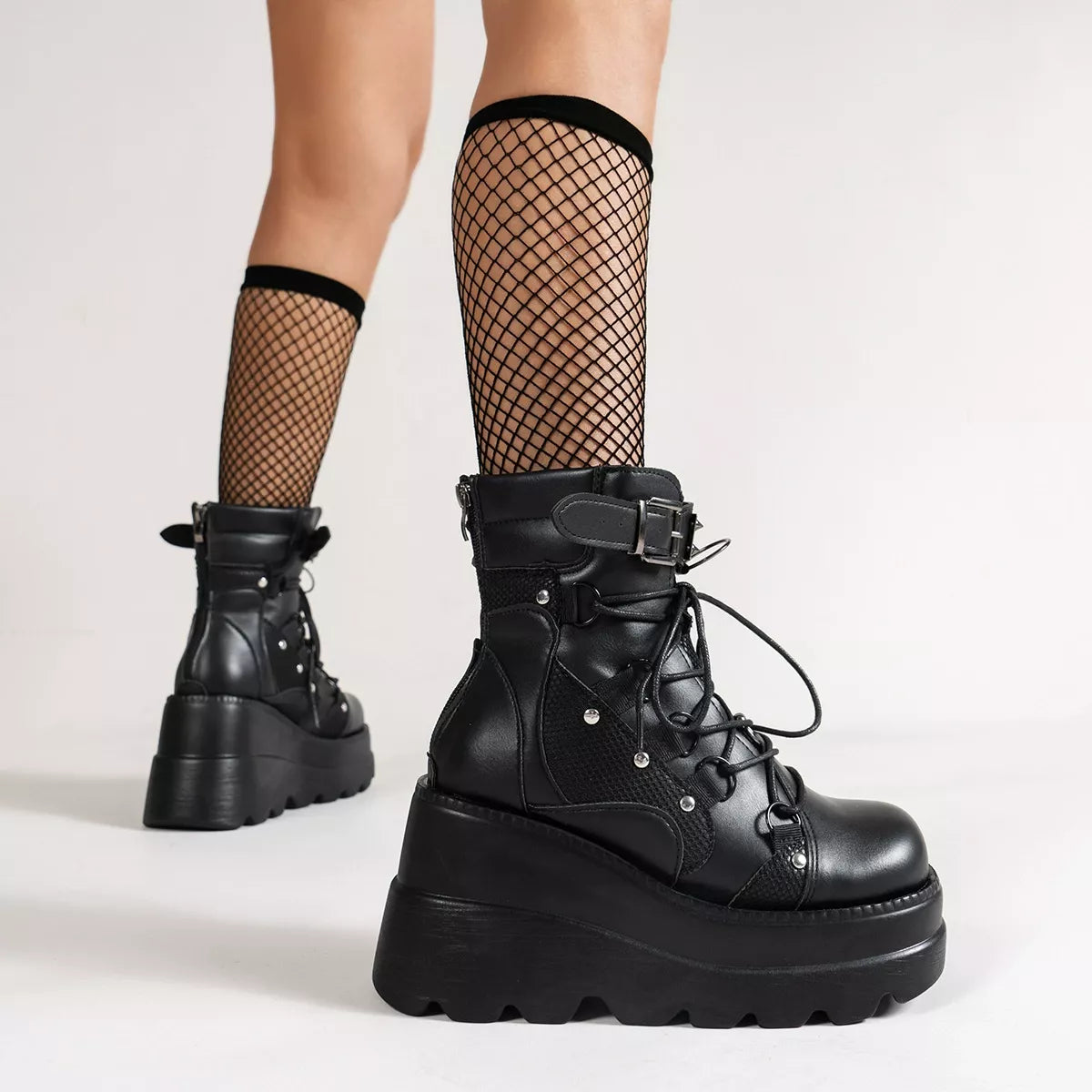 Lace up platform wedge boots angled pair