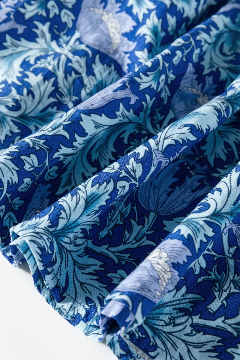 Dusty blue floral V neck tiered maxi dress detail view