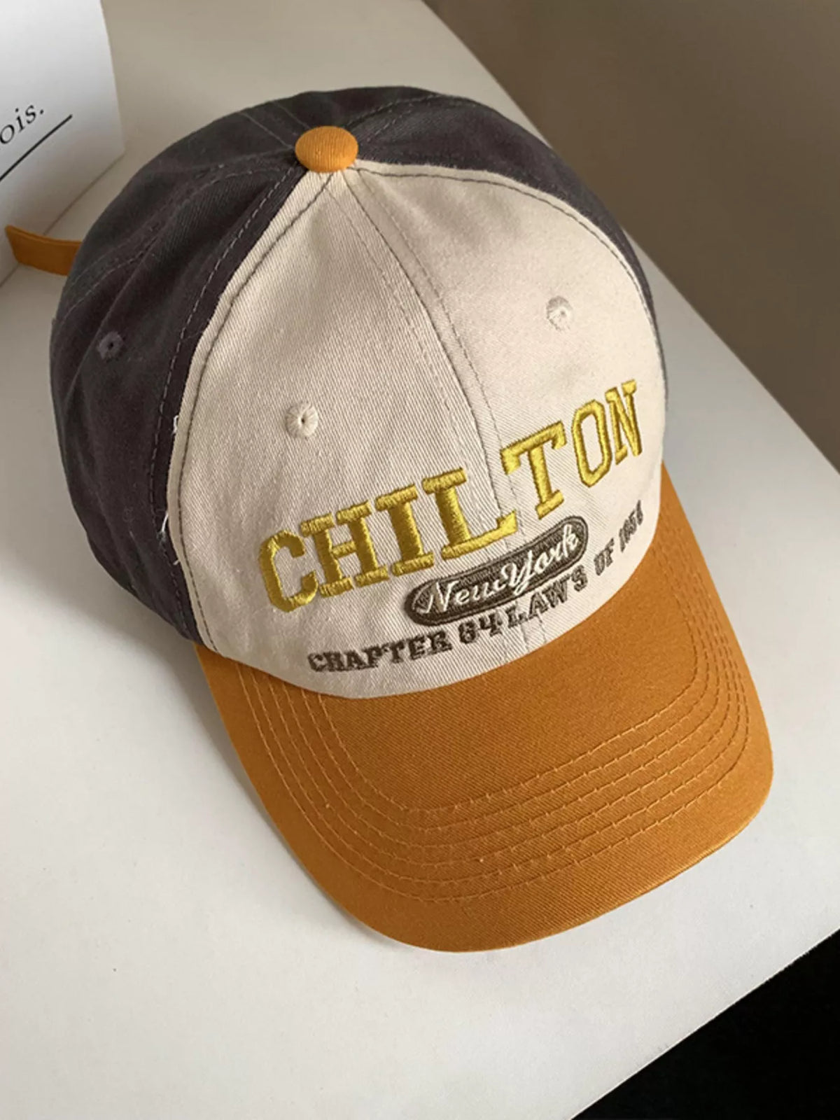 Embroidered cap shown in an alternate colourway