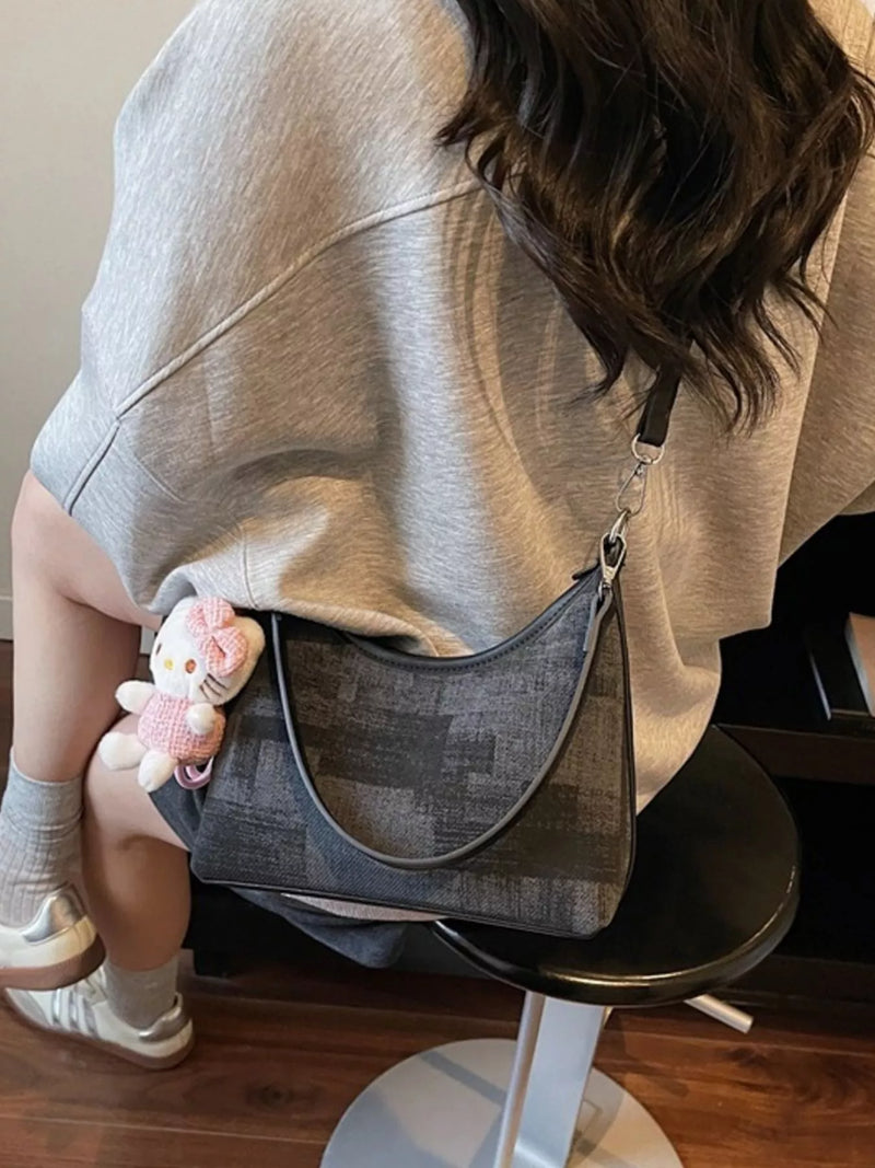 Black mini shoulder bag with adjustable strap