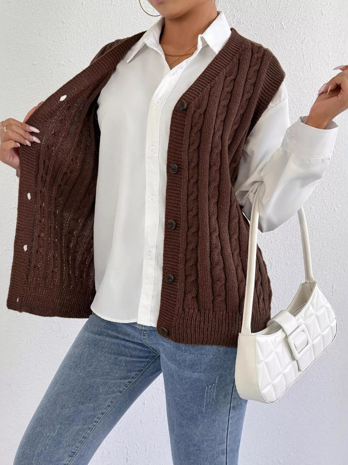 Cable knit button up sweater vest side view