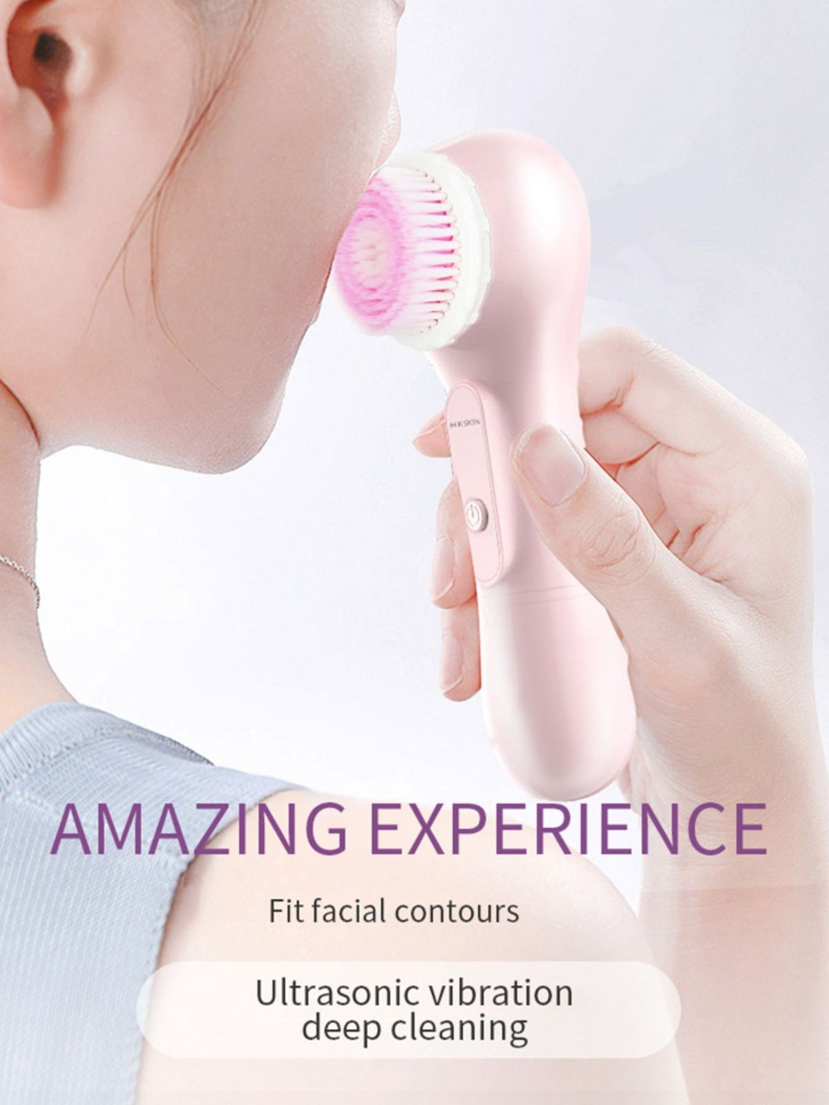 Facial cleansing brush in use
