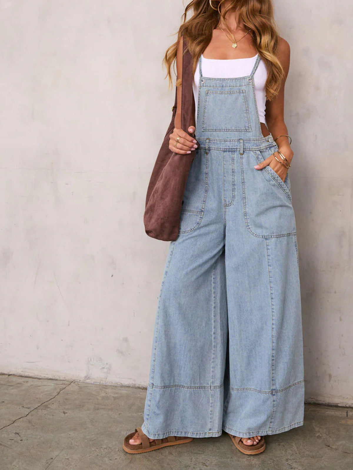 Relaxed fit wide leg denim overalls front view