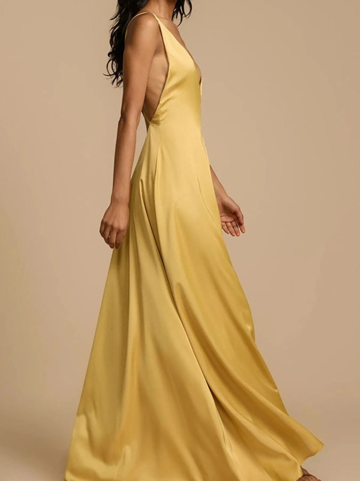 Deep V neck gold maxi dress close up of fabric