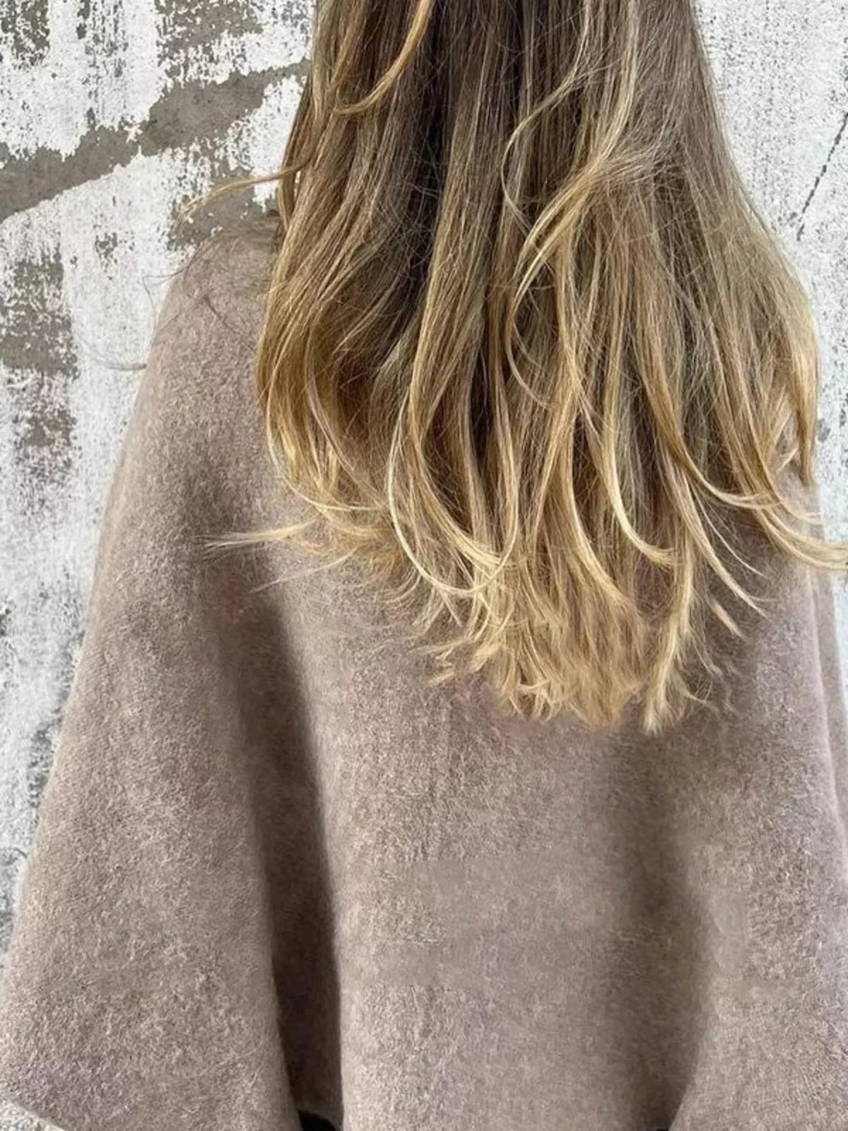 Buttoned fuzzy cardigan layered look