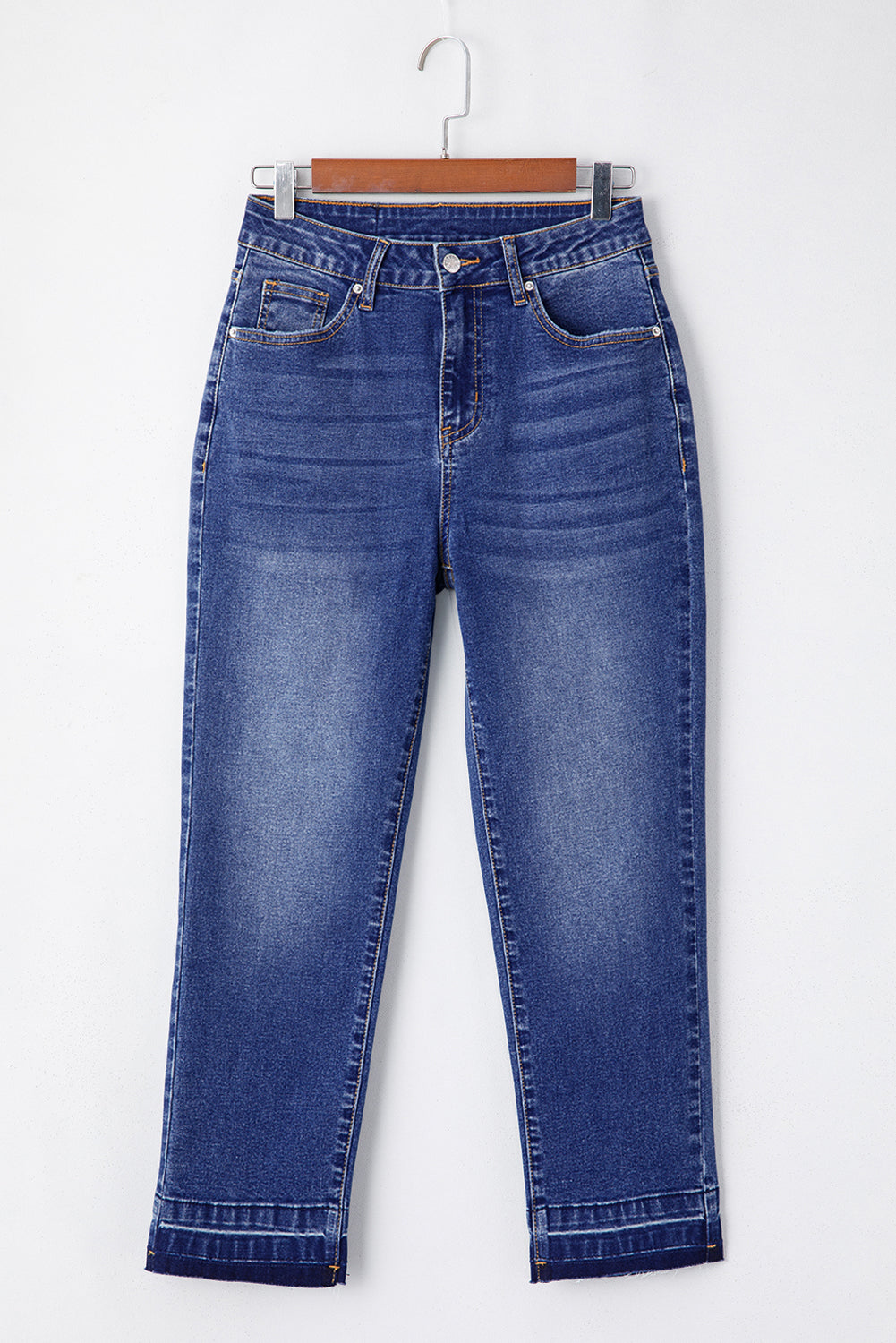 Dark blue cropped jeans back view