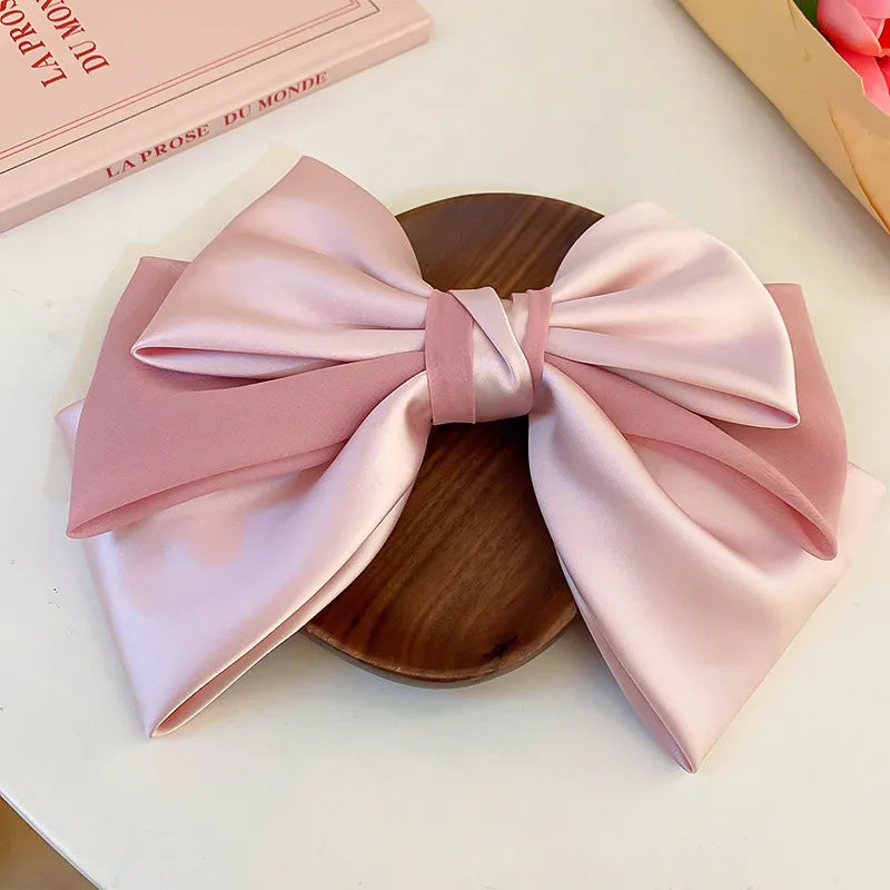 Bow cloth hair clip fabric texture close up