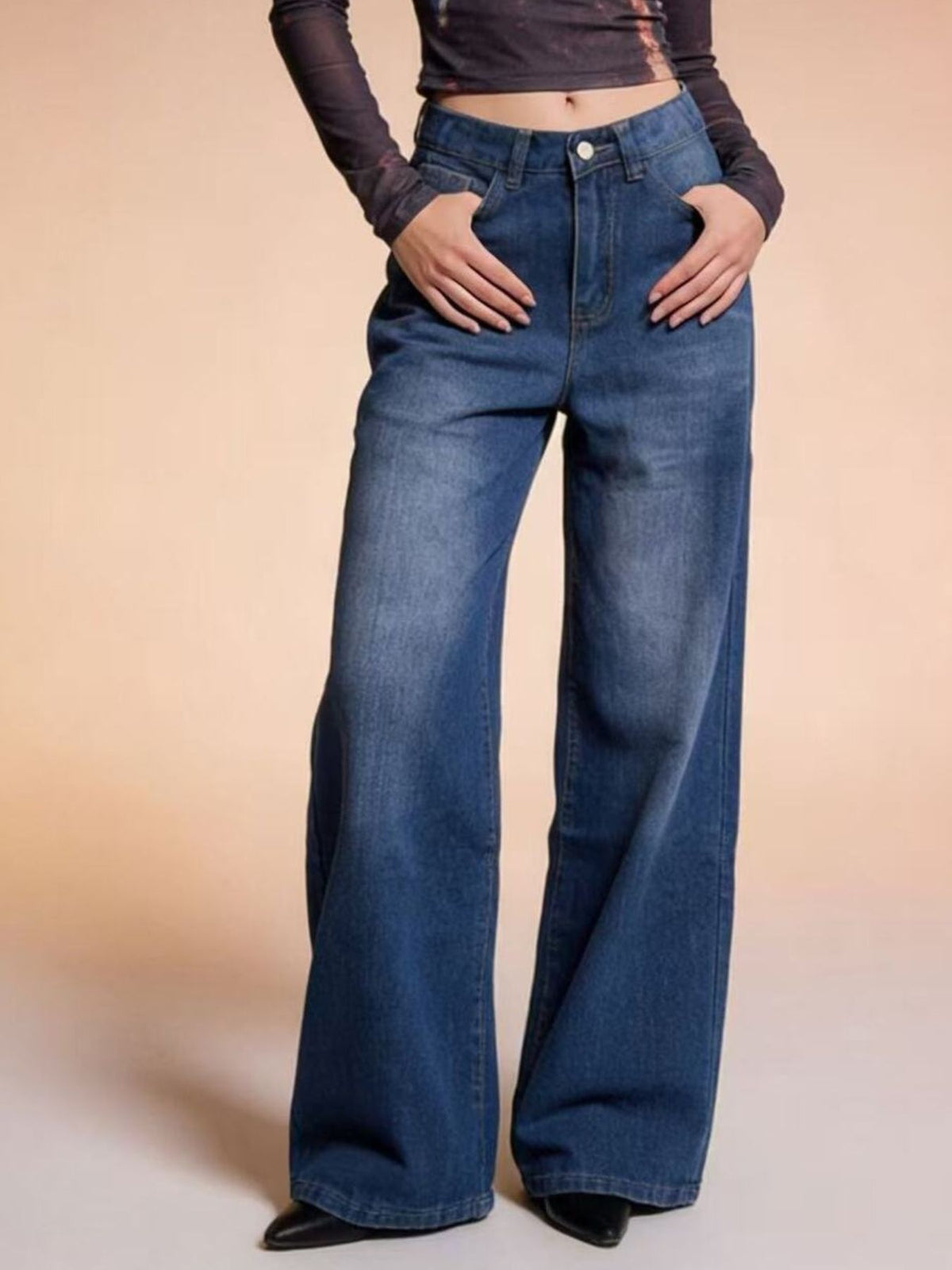 Medium blue high waisted wide leg jeans front view