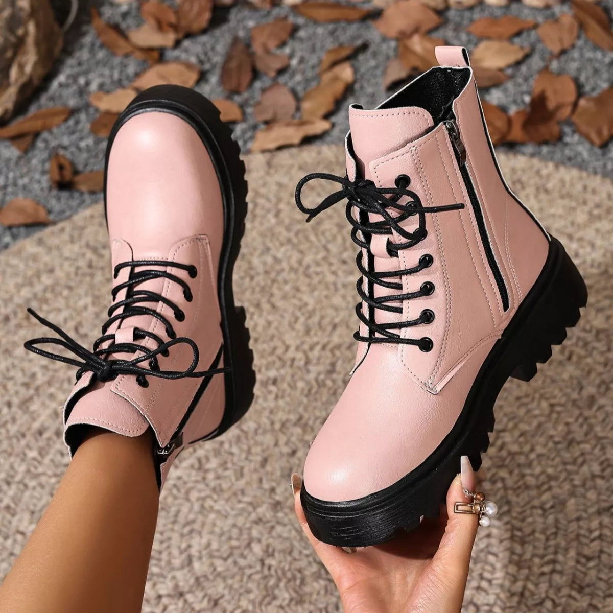 Combat boots worn with denim