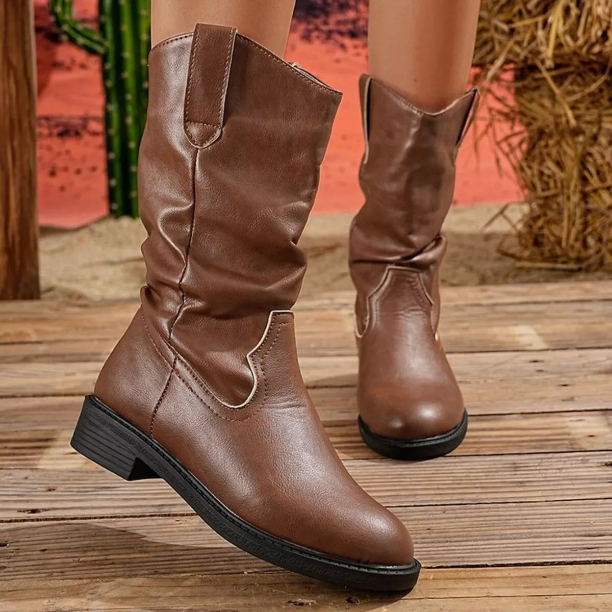 Round toe block heel boots top styling detail