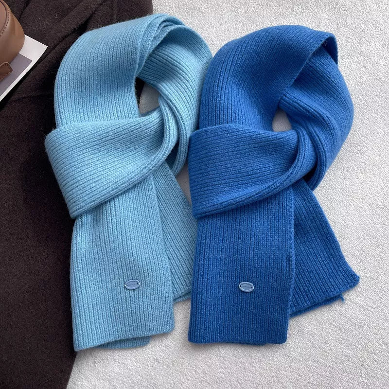 Close view of the knit texture of the wool scarf