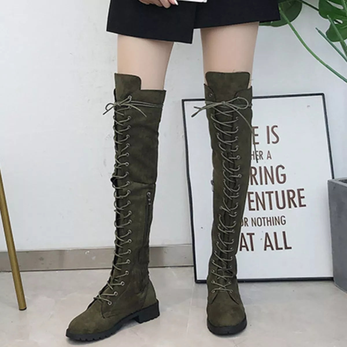 Lace up over the knee boots side profile