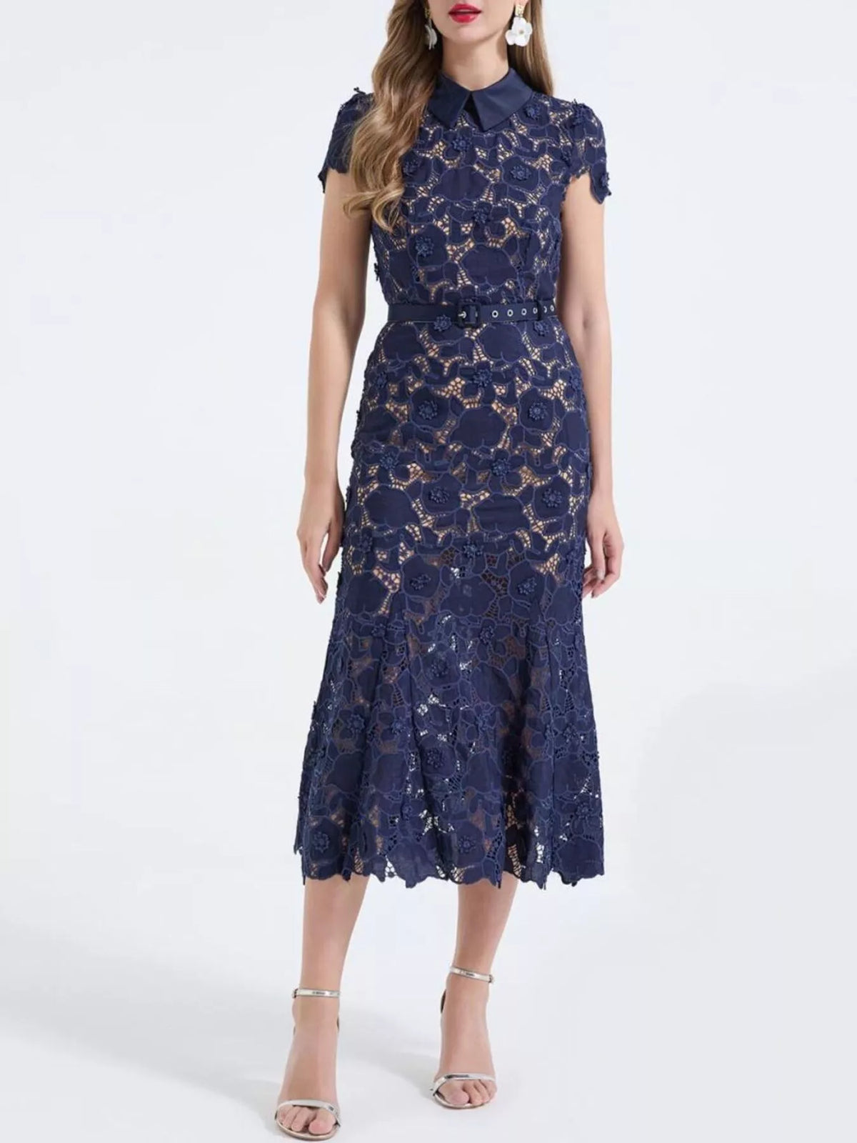 Romantic lace midi dress styled for a wedding