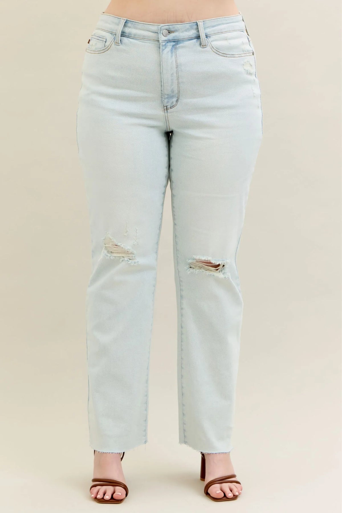 Judy Blue light wash bootcut jeans fray hem detail