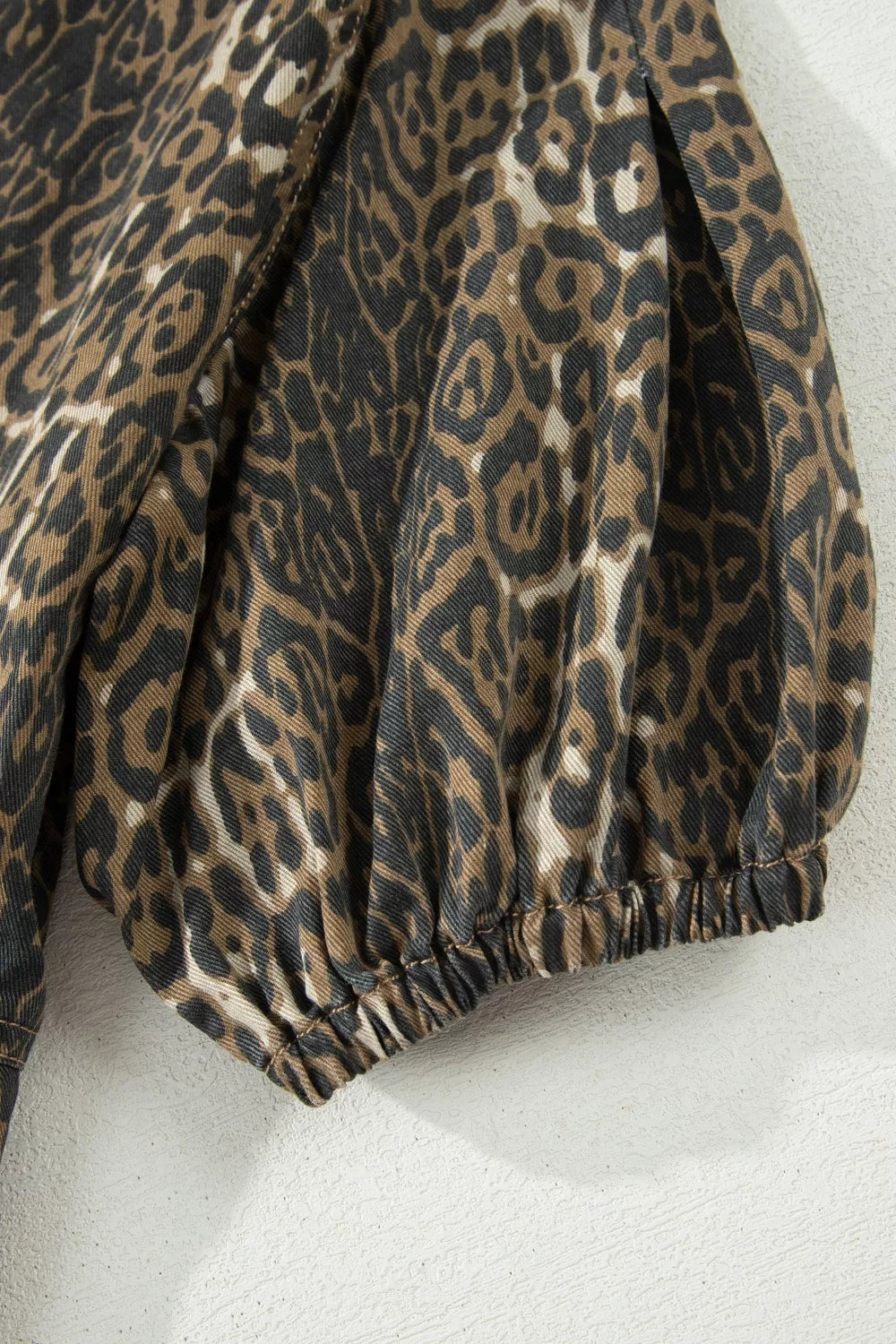 Leopard print puff sleeve denim mini dress detail view