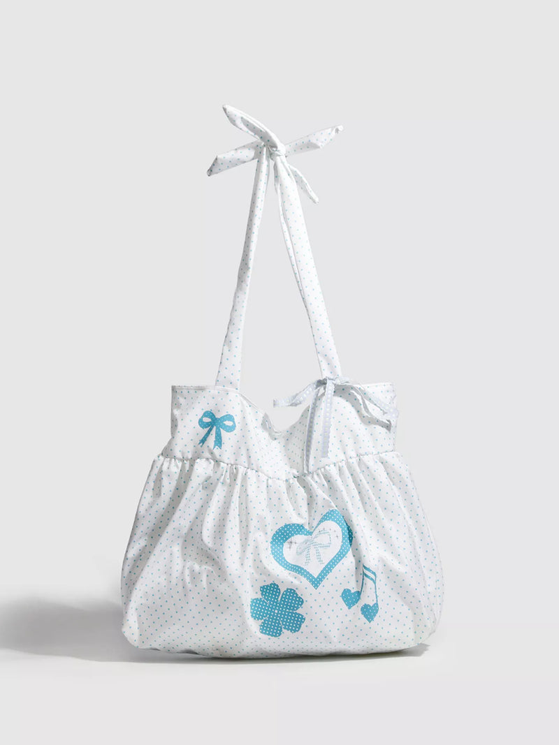 Polka dot heart canvas shoulder bag front view