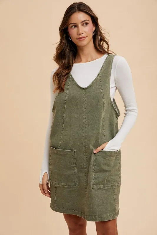 V-neck denim overall dress in army green front view