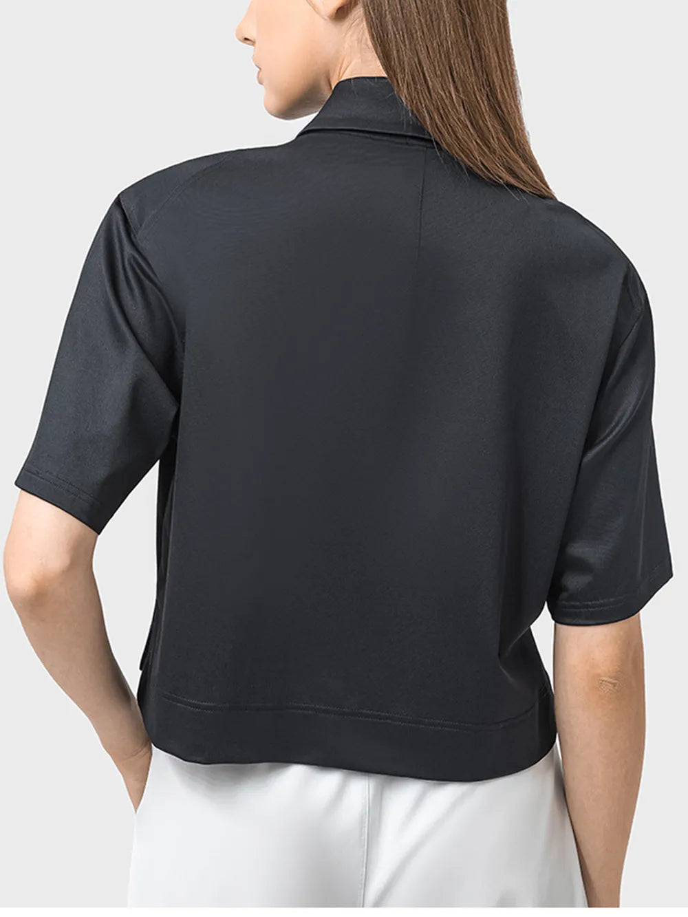 Half button short sleeve active tee angled view