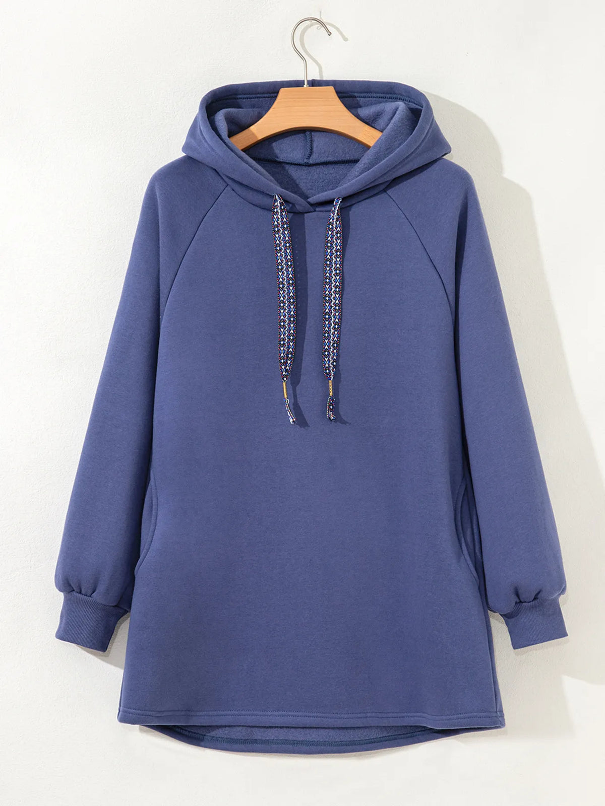 Drawstring hood on navy tunic hoodie