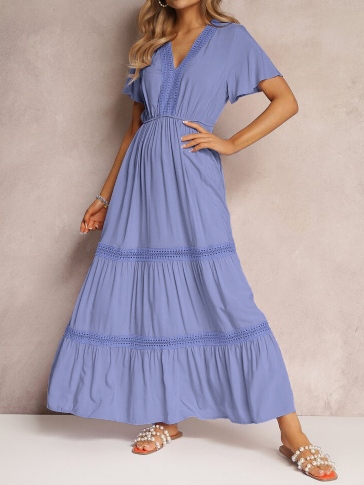 V neckline and lace detail on the maxi dress