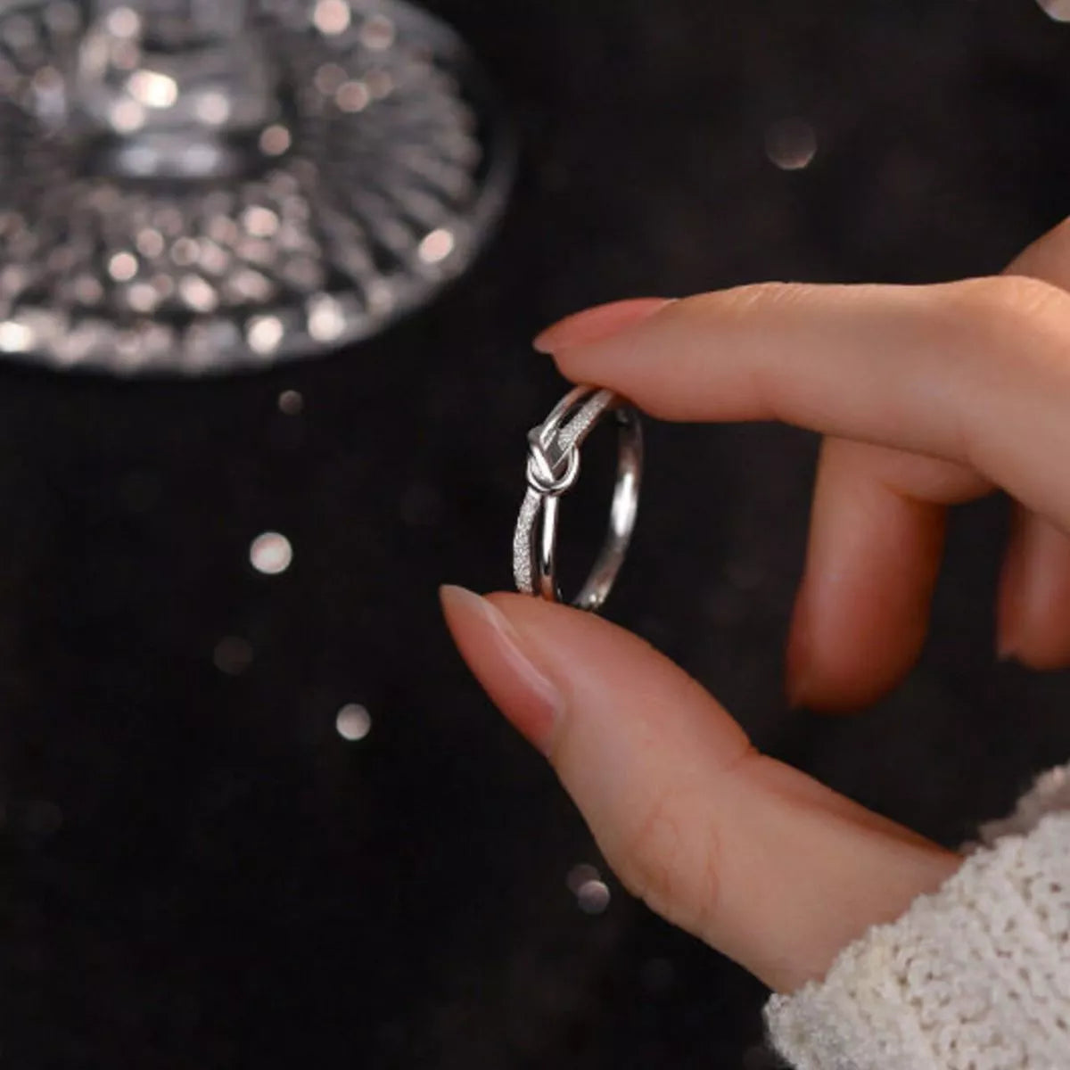 Sterling silver zircon knot ring front view