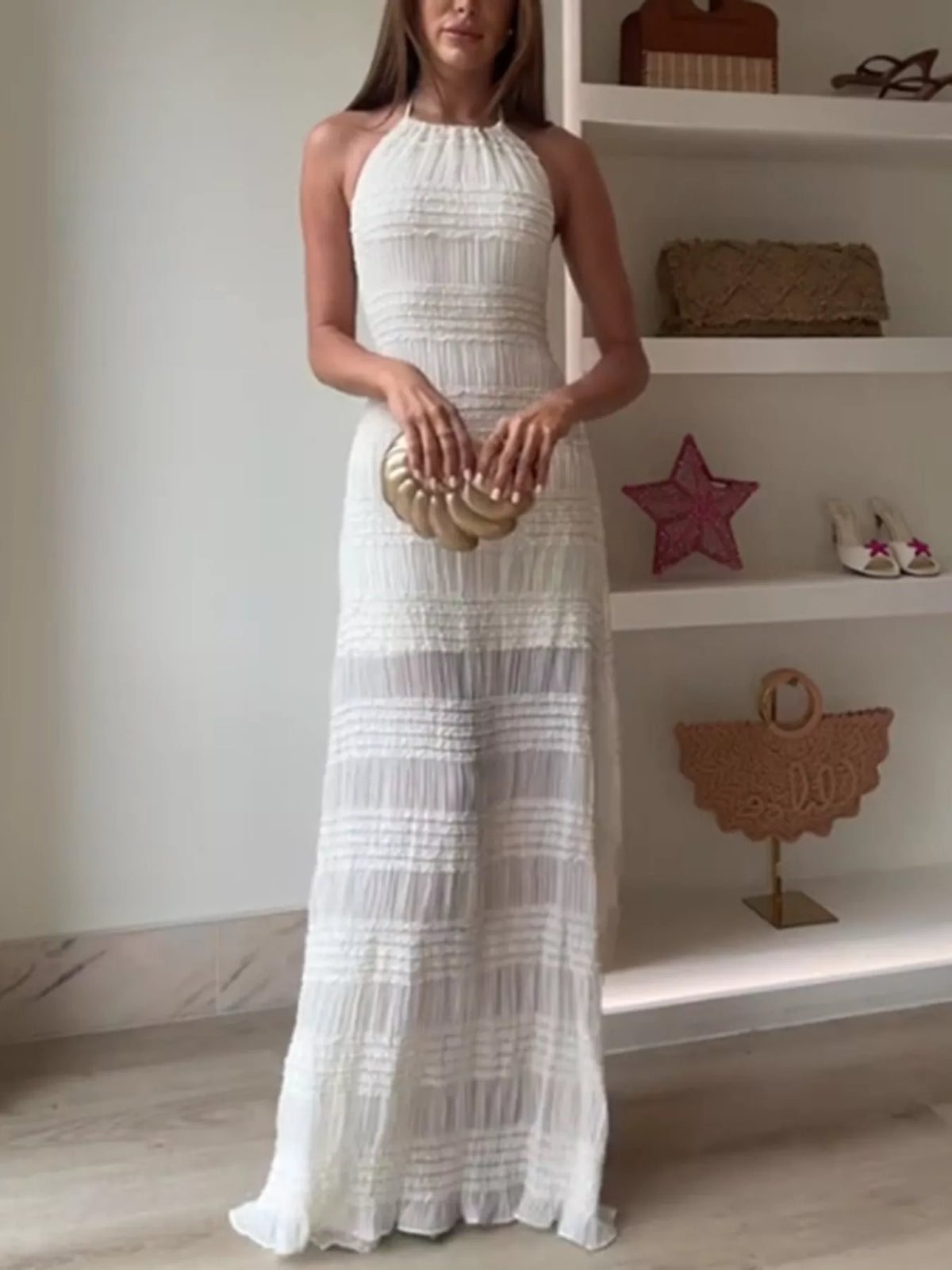 Halter neck maxi dress showing smocked bodice