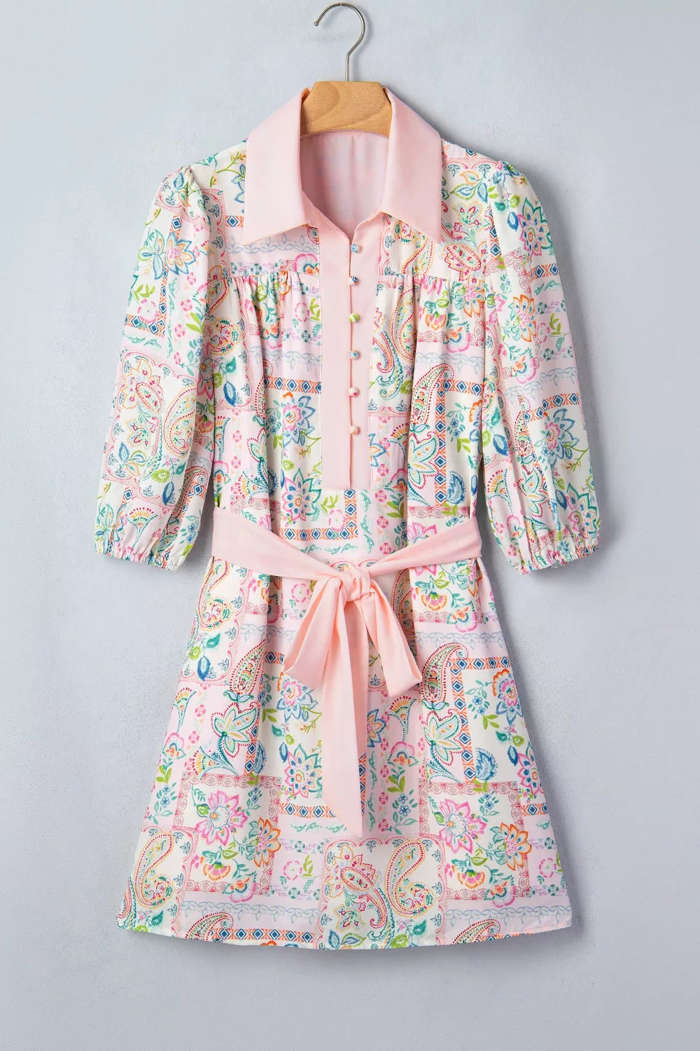 Blush pink floral print belted mini dress back view