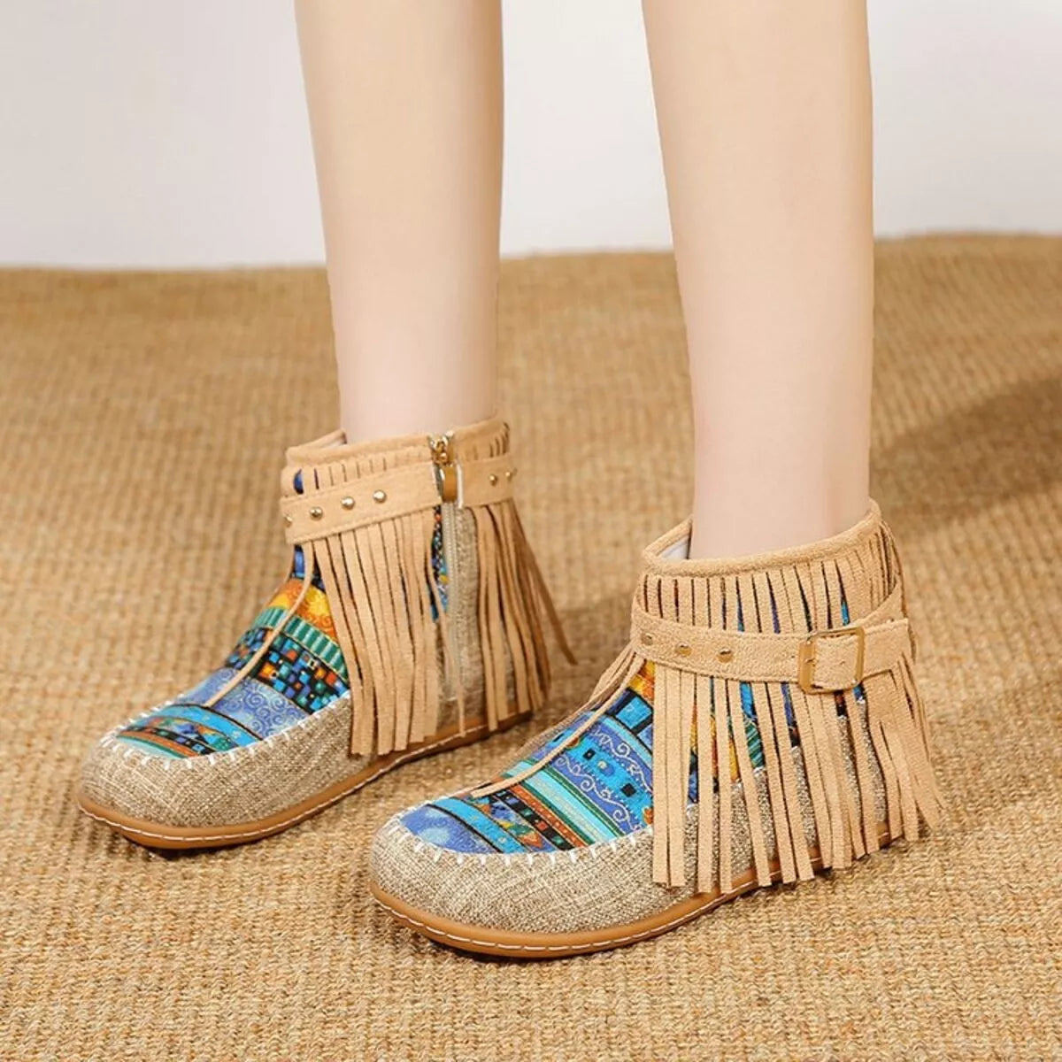 Fringe side zipper ankle boots, pair placed together
