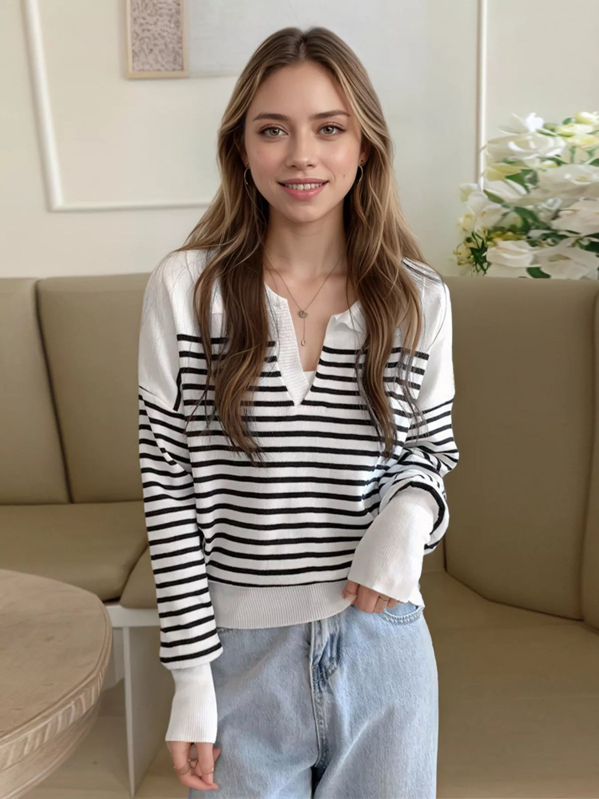 Striped long sleeve knit top, styled with jeans