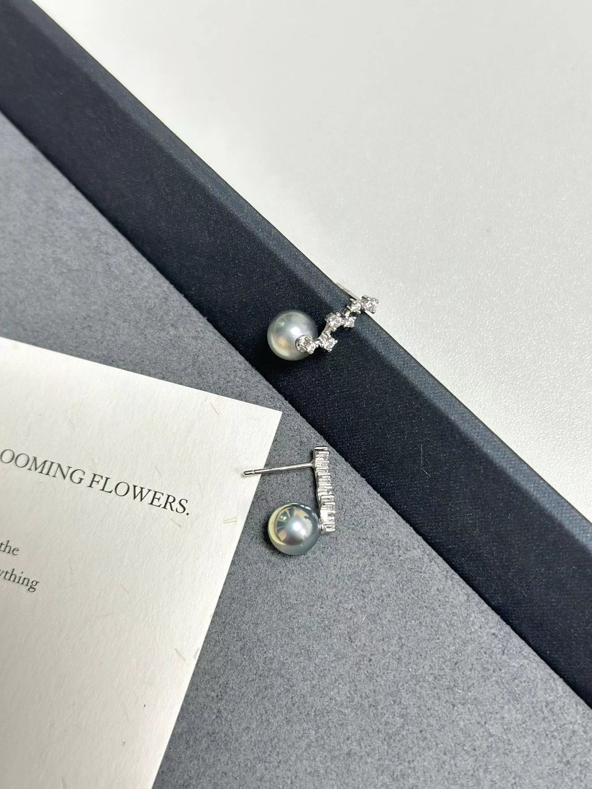 Zircon accent sterling silver earrings close up