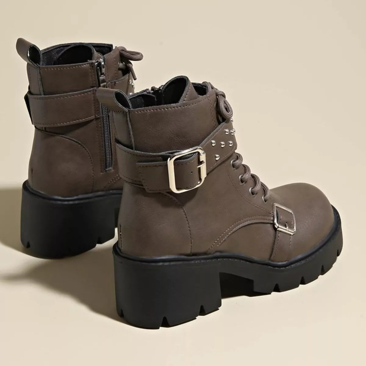 Round toe block heel boots pair styled together