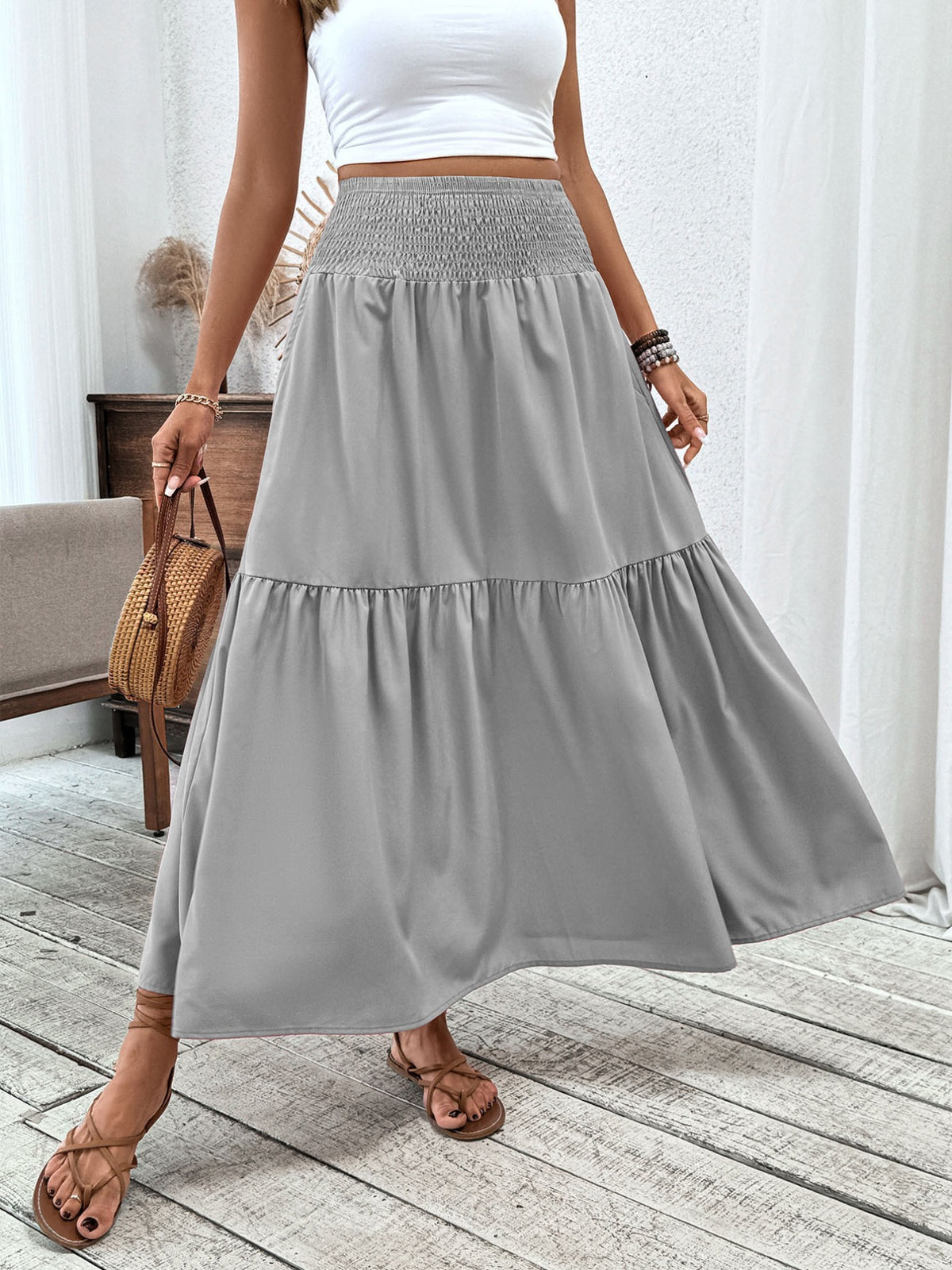 Tiered skirt styled with a fitted tank top