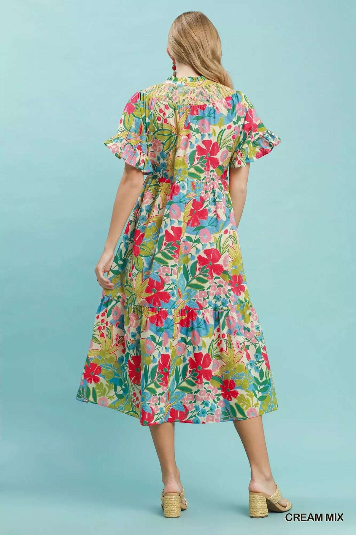 Cream tropical floral tiered midi dress with ruffle sleeves front view