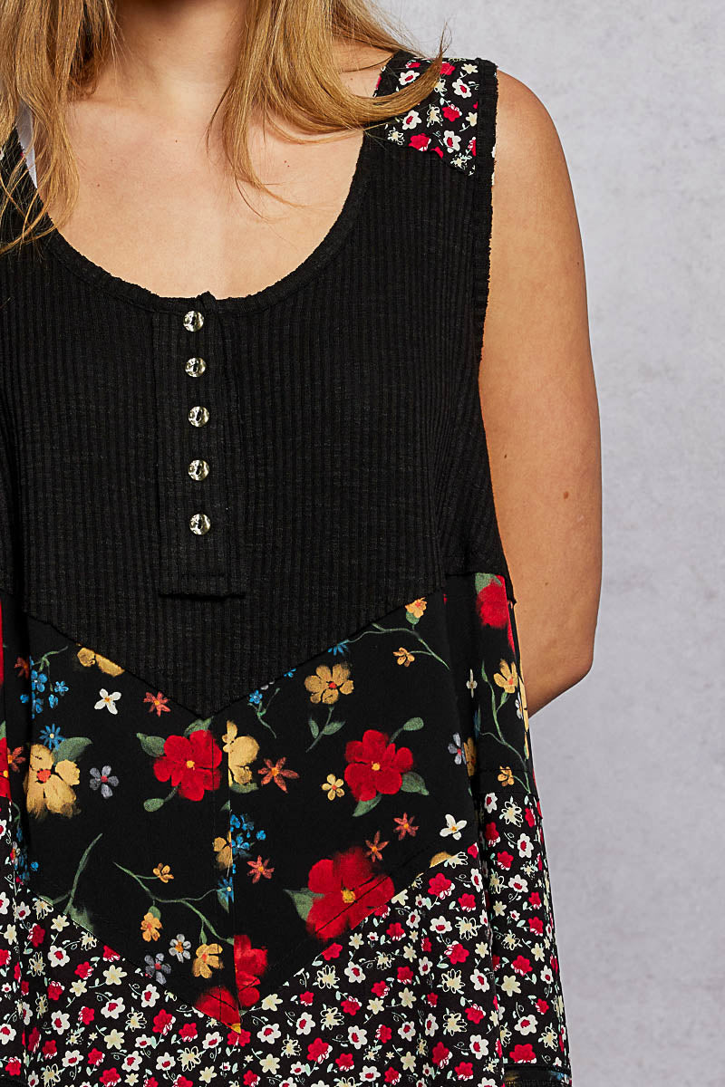 Sleeveless ribbed tank styled with jeans