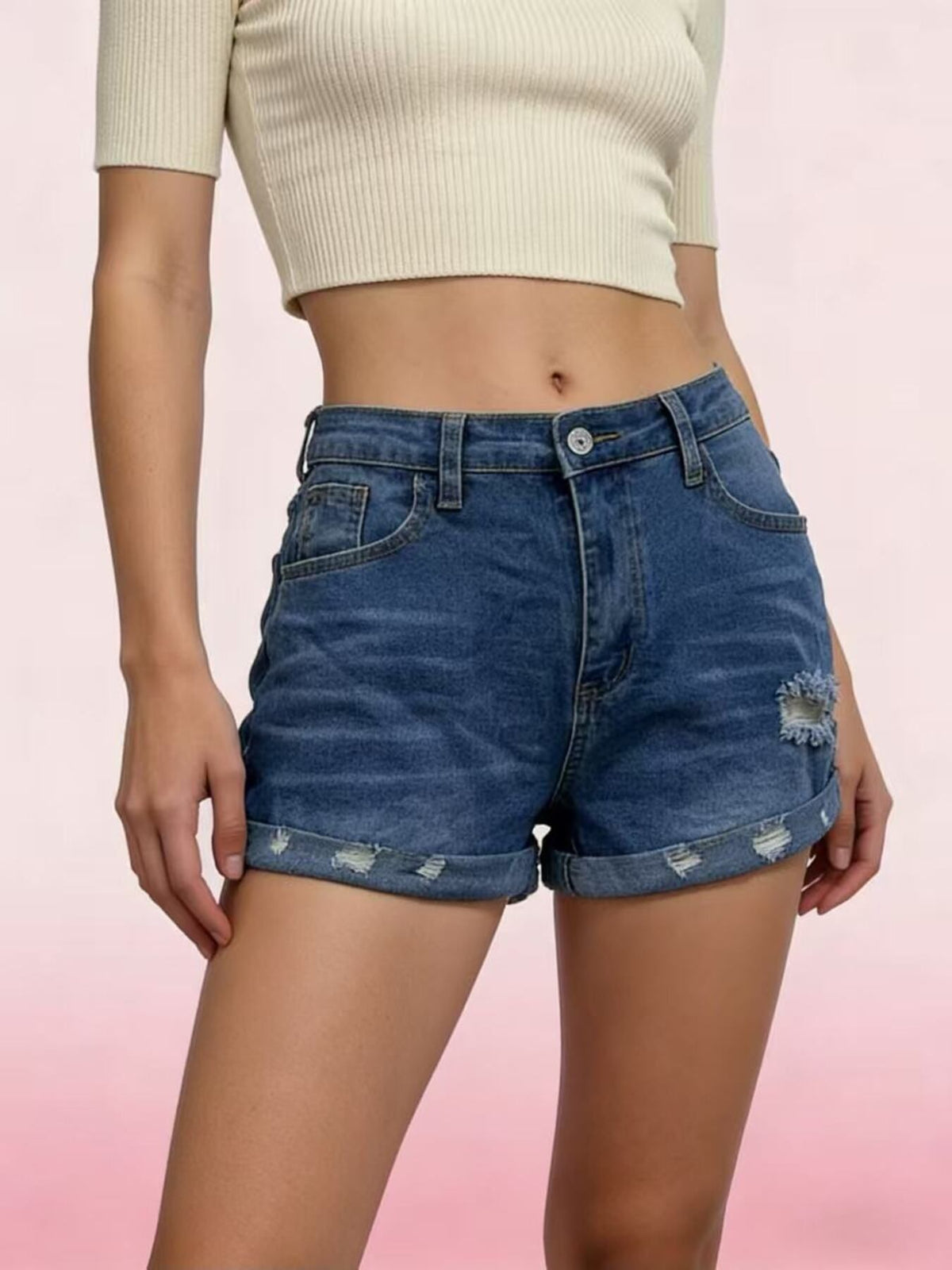 Distressed shorts alternate color hem detail