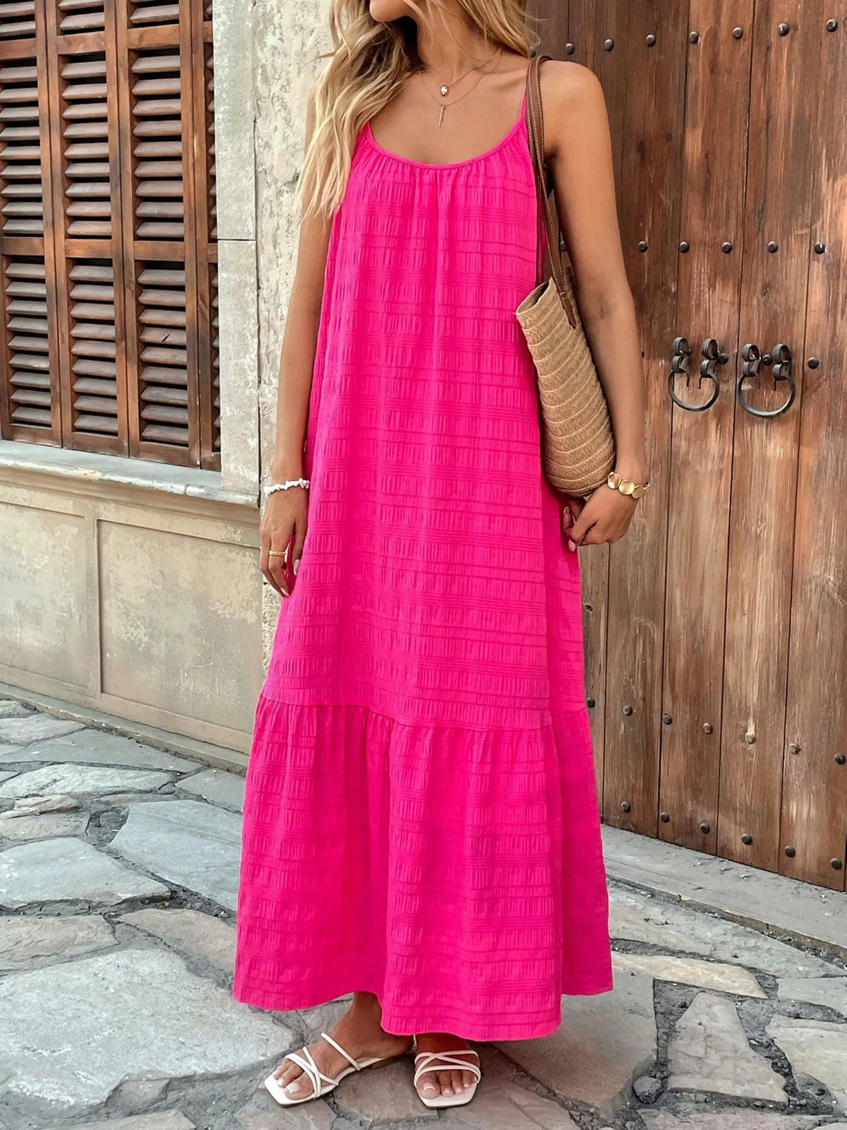 Pink tiered cami maxi dress on model