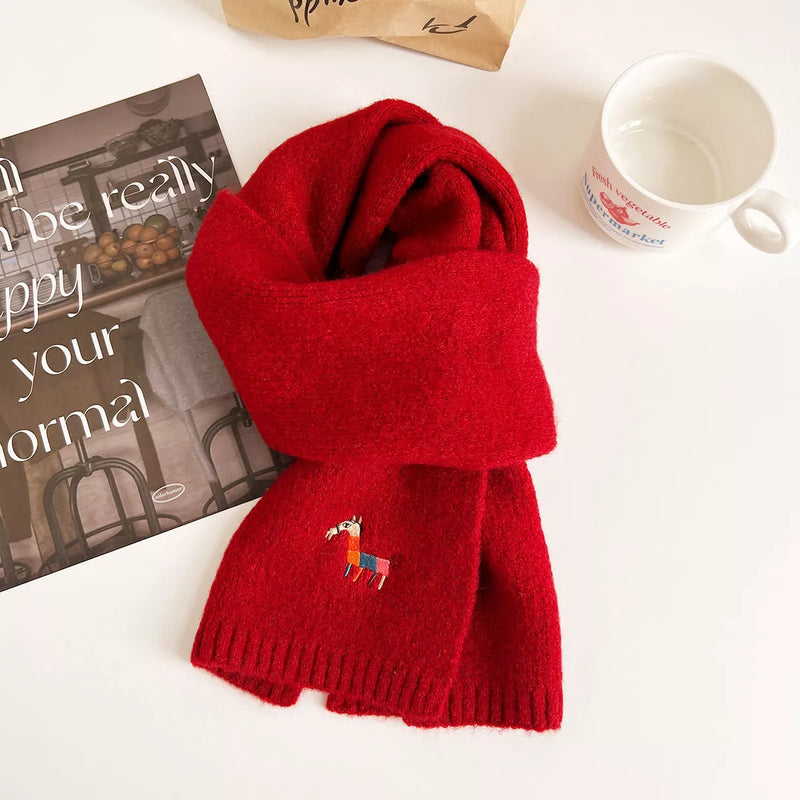 Embroidered warm winter scarf shown around the neck
