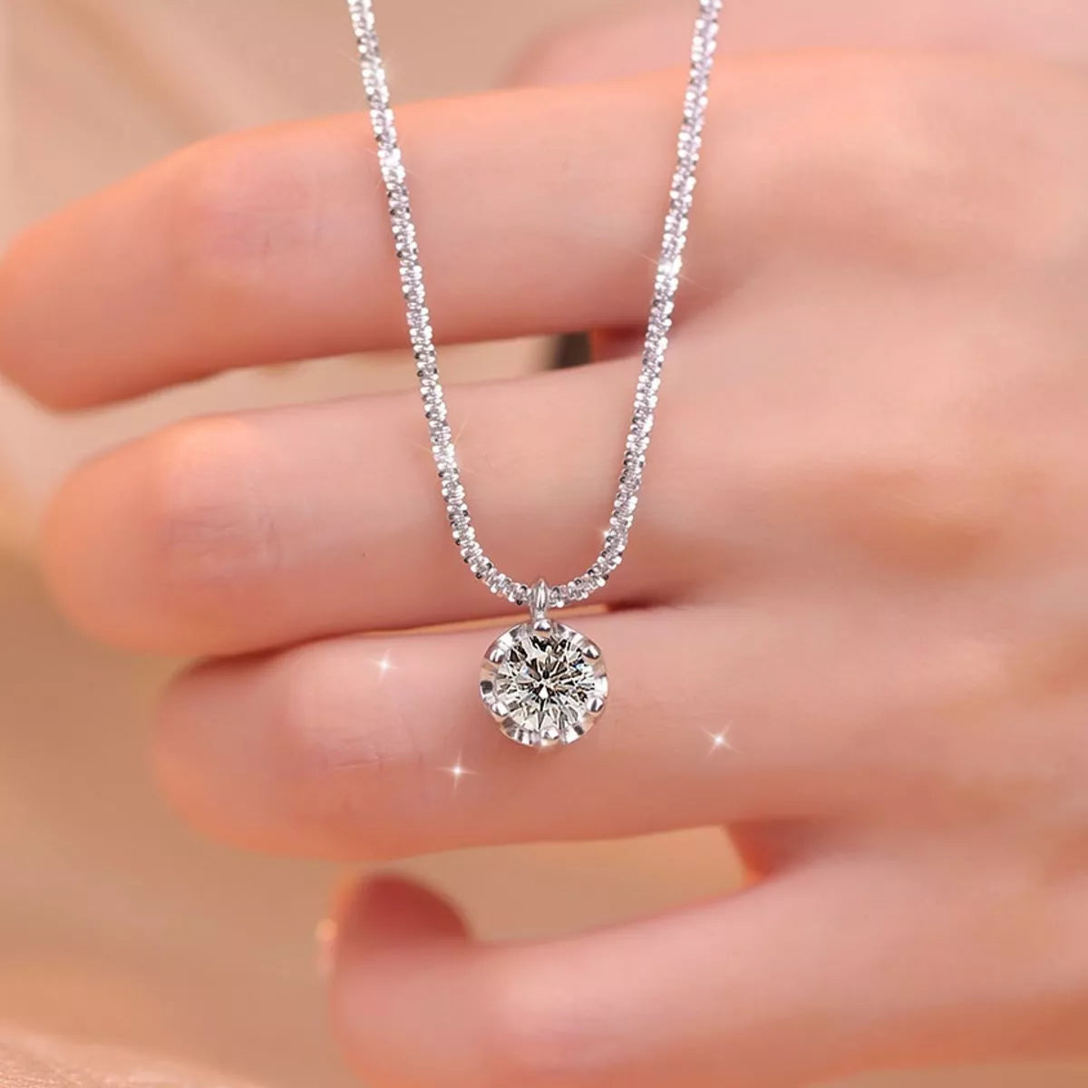 Moissanite necklace shown flat with the full chain