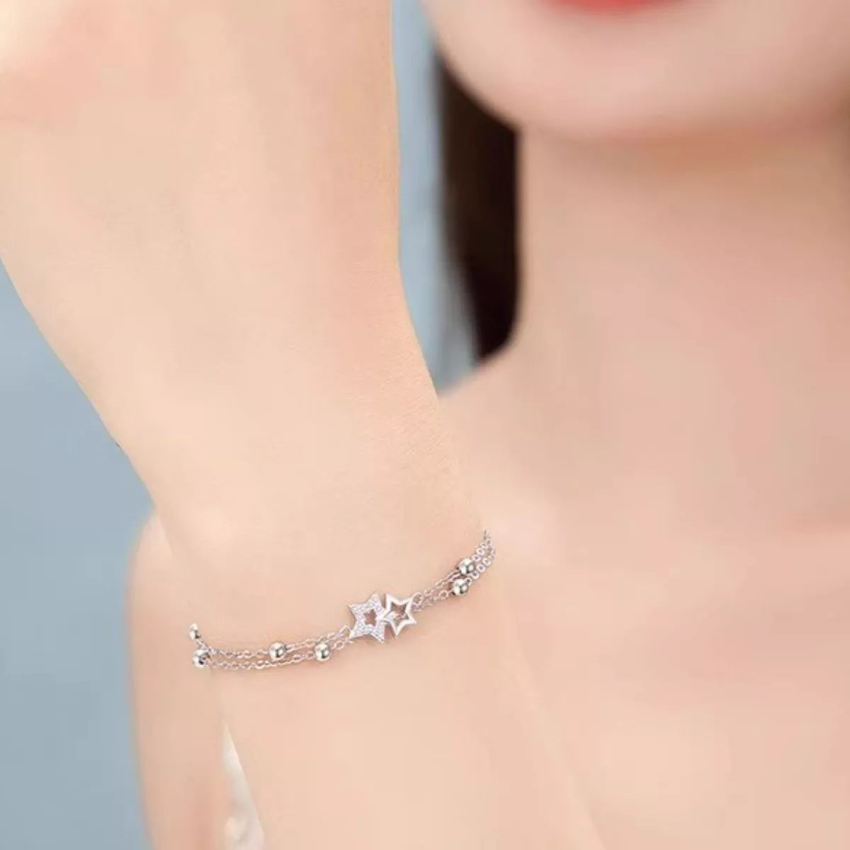 Star chain bracelet displayed with its matching box