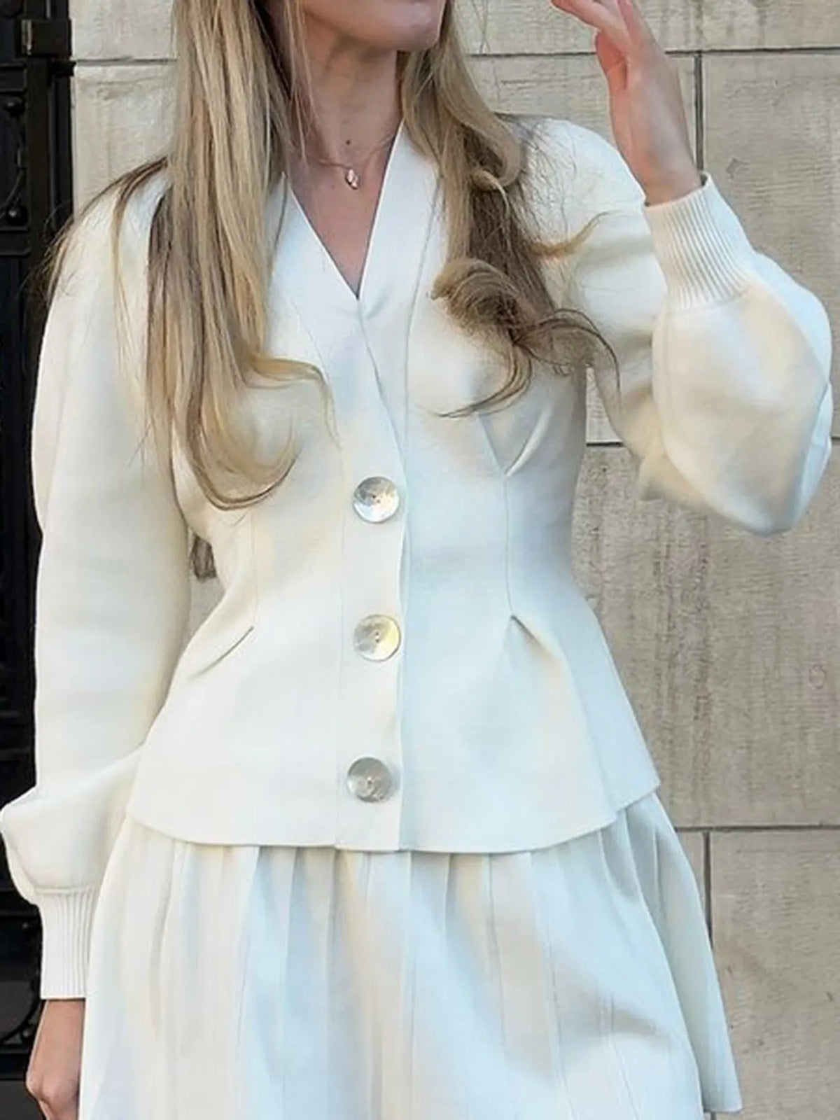 Button up V neck ruffle knit cardigan back view