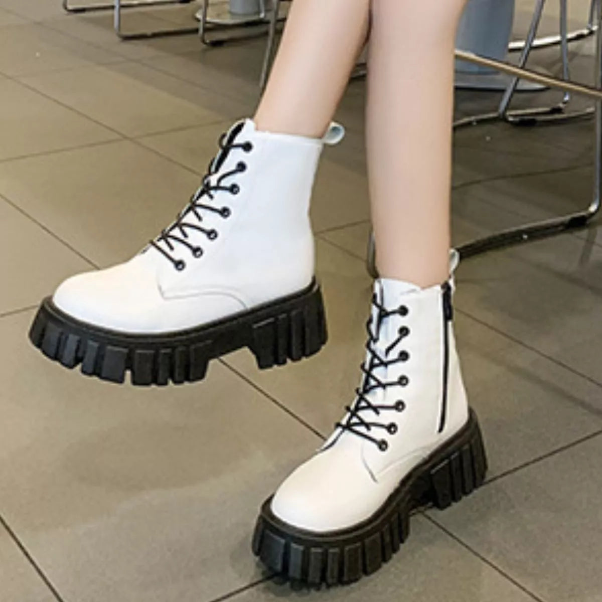 Round toe lace up chunky boots pair styled together