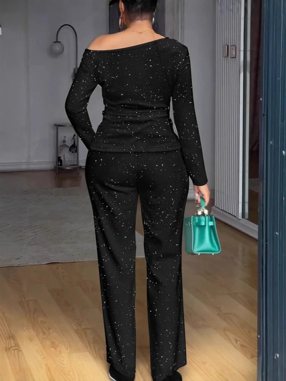 Black matching glitter top and pants set detail
