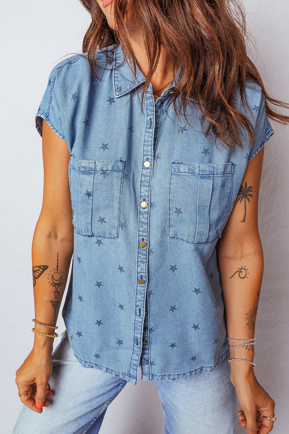 Light blue denim shirt close up of the front detail