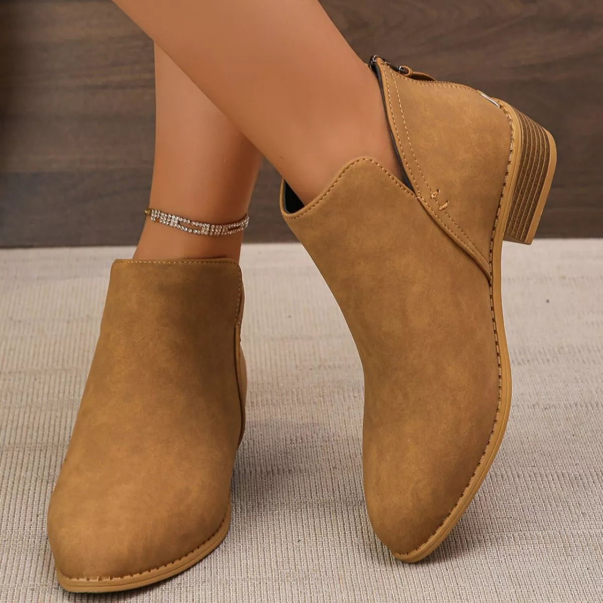 Point toe block heel ankle boots strap detail
