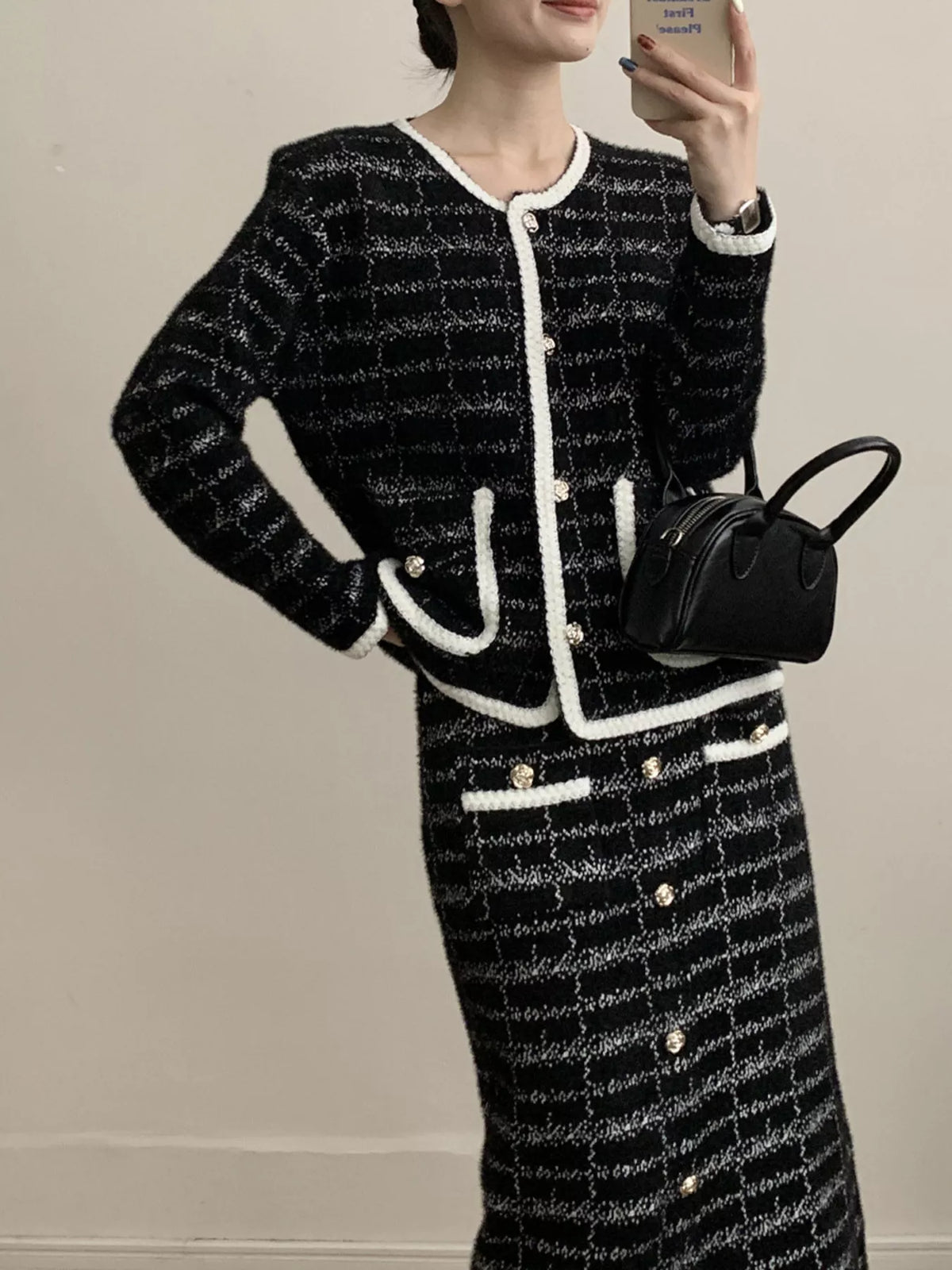 Tweed jacket and skirt set styled look